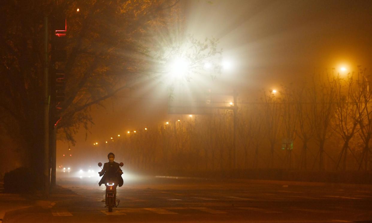 <span>The climate stripes reveal the change in air quality when governments are forced to act.</span><span>Photograph: Beijing Youth Daily/VCG/Getty Images</span>