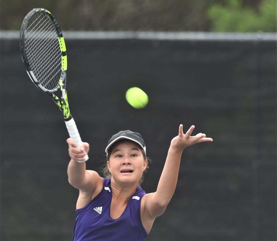 College Station's Maya Diyasheva reaches for a shot during her mixed doubles match with Abilene Wylie's Trevor Short and Stealey Crousen. Diyasheva and Paxton O'Shea won the Class 5A championship match 4-6, 6-3, 6-4 on Wednesday at Northside Tennis Center in Helotes.
