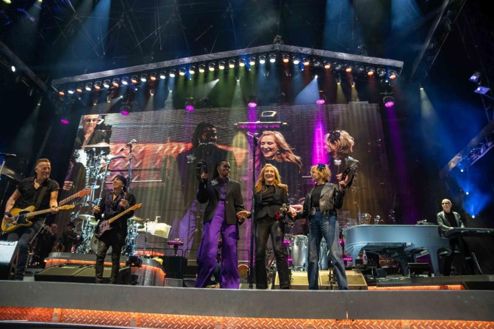 Bruce Springsteen (left to right), Steven Van Zandt, Michelle Obama, Patti Scialfa, Kate Capshaw and Roy Bittan at the April 28 E Street Band show at the Lluis Companys Olympic Stadium in Barcelona, Spain.