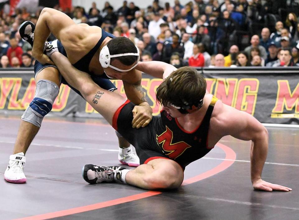 Penn State’s Aaron Brooks attempts to keep Maryland’s Jaxton Smith from going out of bounds in their 197-pound match of the Nittany Lions’ 42-6 win on Sunday. Brooks took care of Smith, 13-4. Jennie Tate/For the CDT