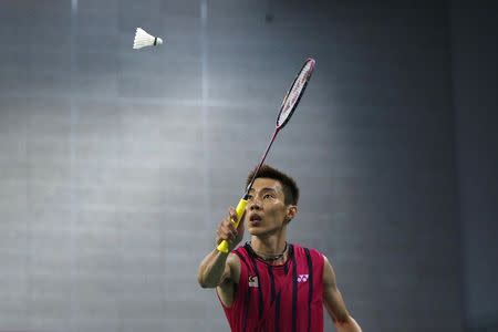 Malaysia's Lee Chong Wei returns a shot against China's Lin Dan during the men's singles semi-final badminton match at Gyeyang Gymnasium at the 17th Asian Games in Incheon September 28, 2014. REUTERS/Olivia Harris