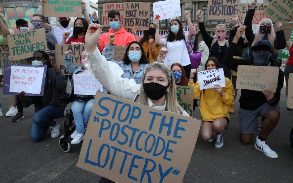 Teenagers protested on Friday about the downgrades system - Andrew Milligan/PA