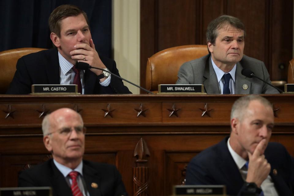 Clockwise from upper right, U.S. Rep. Mike Quigley (D-IL), Rep. Sean Patrick Maloney (D-NY), Rep. Peter Welch (D-VT) and Rep. Eric Swallwell (D-CA) listen during a hearing.