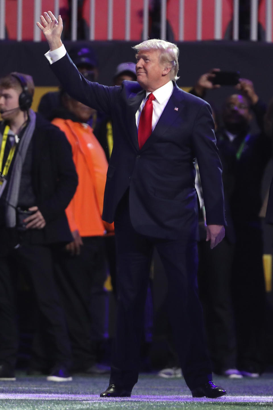 <p>U.S. President Donald Trump on field during the national anthem prior to the CFP National Championship presented by AT&T between the Georgia Bulldogs and the Alabama Crimson Tide at Mercedes-Benz Stadium on January 8, 2018 in Atlanta, Georgia. (Photo by Christian Petersen/Getty Images) </p>