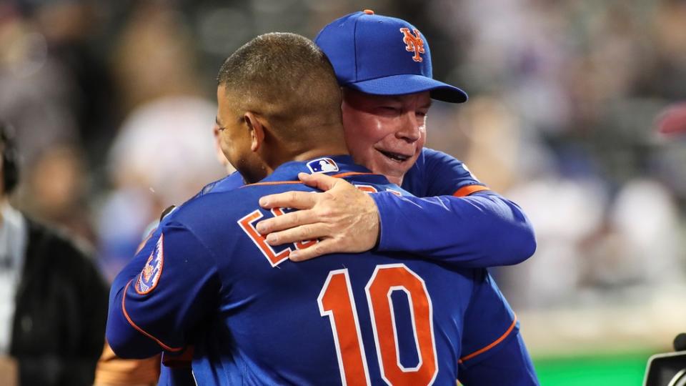 May 29, 2022; New York City, New York, USA; New York Mets third baseman Eduardo Escobar (10) is congratulated by manager Buck Showalter (11) after hitting a game winning RBI double to beat the Philadelphia Phillies 5-4 in ten innings at Citi Field. Mandatory Credit: Wendell Cruz-USA TODAY Sports