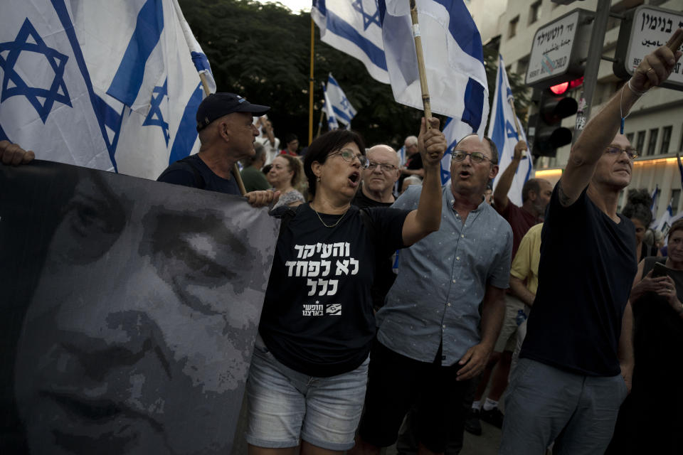 Israelis march in support of the judicial system during a protest against the plans by Prime Minister Benjamin Netanyahu's government to overhaul it, in Tel Aviv, Israel, Wednesday, Aug. 2, 2023. (AP Photo/Maya Alleruzzo)