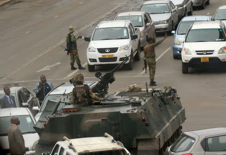 Military vehicles and soldiers patrol the streets in Harare. REUTERS/Philimon Bulawayo