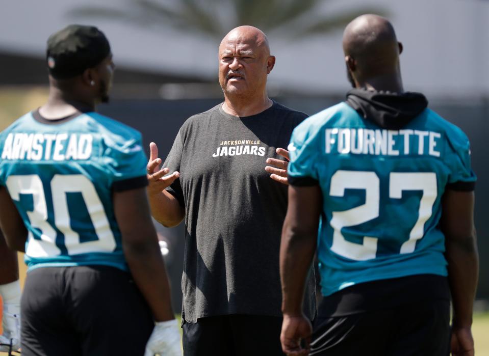 Longtime NFL coach Terry Robiskie, center, says Brian Flores' bold move to sue the NFL for discriminatory hiring practices is one he and others considered over the years.