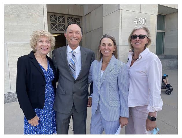 Arslan Guney, second from left, stands outside court with his wife, Linda Guney (left), his attorney, Hollynd Hoskins (second from right), and investigator Kirsten Palmquist. (Photo: Courtesy of Hollynd Hoskins)