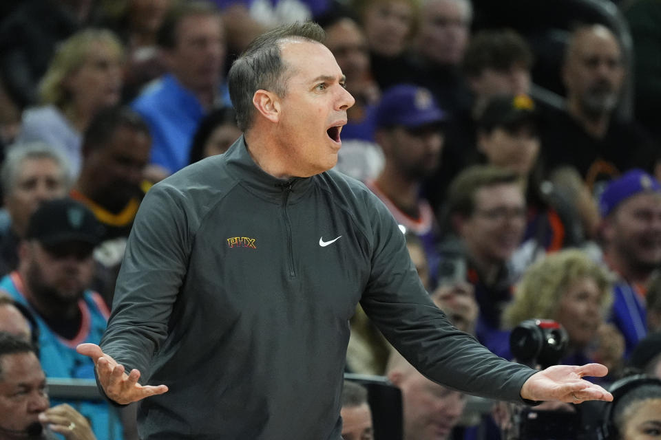 Phoenix Suns coach Frank Vogel argues with officials during the second half of the team's NBA basketball game against the Milwaukee Bucks on Tuesday, Feb. 6, 2024, in Phoenix. The Suns won 114-106. (AP Photo/Ross D. Franklin)