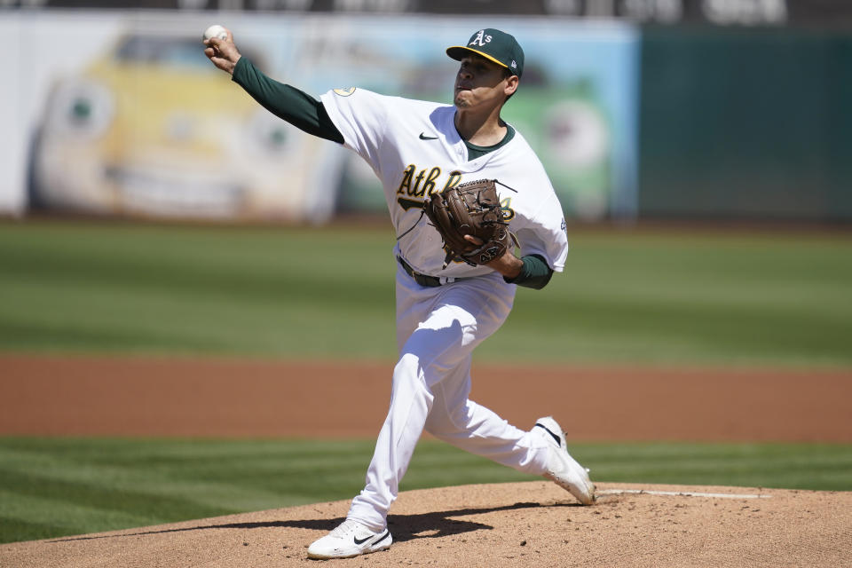 Oakland Athletics' Adrian Martinez pitches against the New York Yankees during the first inning of a baseball game in Oakland, Calif., Sunday, Aug. 28, 2022. (AP Photo/Jeff Chiu)