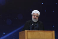 In this photo released by the official website of the office of the Iranian Presidency, President Hassan Rouhani speaks during a ceremony commemorating "National Day of Nuclear Technology" in Tehran, Iran, Tuesday, April 9, 2019. Rouhani declared that Iran's elite paramilitary Revolutionary Guard's popularity would only surge in the wake of the designation, saying guard members would be dearer "than any other time in the hearts of Iranian nation" following the White House's decision to designate the force a foreign terrorist organization. (Iranian Presidency Office via AP)
