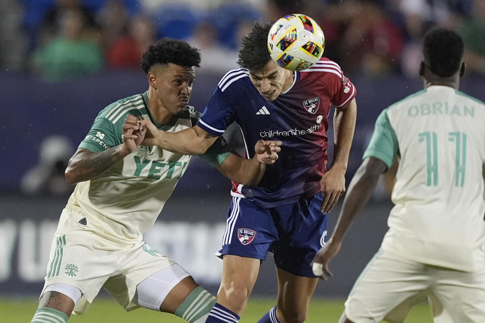 FC Dallas forward Petar Musa, center, heads the ball against Austin FC defender Julio Cascante, left, and forward Jáder Obrian (11) during the second half of an MLS soccer match Saturday, May 11, 2024, in Frisco, Texas. (AP Photo/LM Otero)