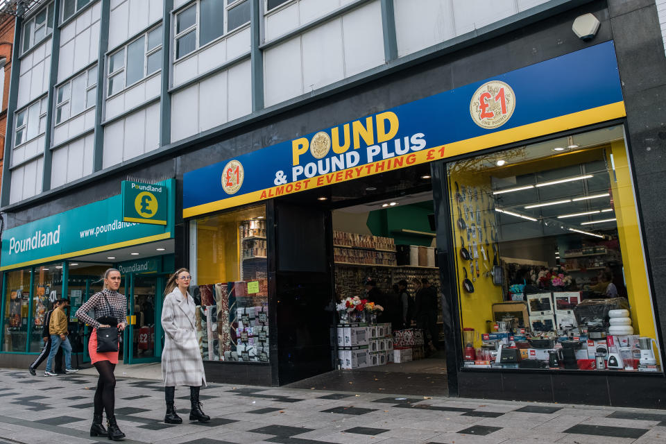 debt Shoppers pass branches of pound stores on 28 October 2022 in Slough, United Kingdom. Many cost-conscious consumers have switched to discount outlets in order to try to manage tight household budgets during the cost of living crisis. (photo by Mark Kerrison/In Pictures via Getty Images)