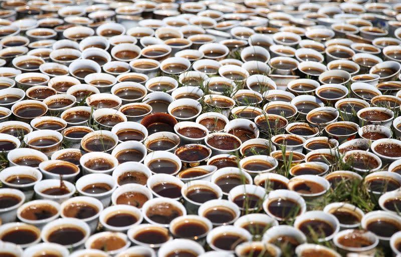 A collection of some 8,000 traditional porcelain cups filled with Bosnian coffee is seen at the Potocari-Srebrenica Memorial Centre for victims of the 1995 massacre of around 8,000 Muslim men and boys