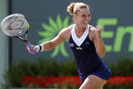 Mar 26, 2014; Miami, FL, USA; Dominika Cibulkova celebrates after her match against Agnieszka Radwanska (not pictured) on day ten of the Sony Open at Crandon Tennis Center. Cibulkova won 3-6, 7-6, 6-3. Geoff Burke-USA TODAY Sports