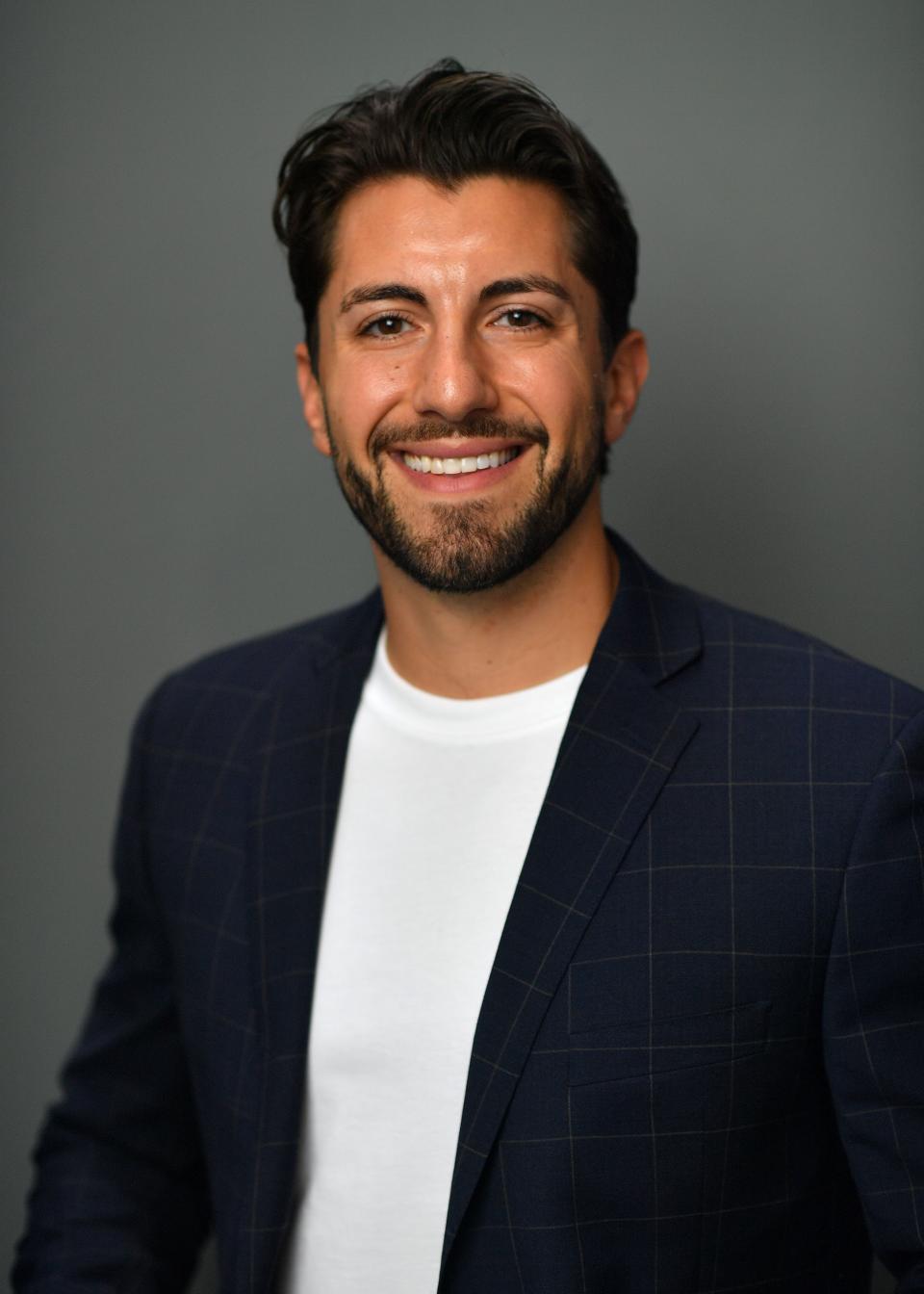 Former 'Bachelorette' contestant Jason Tartick poses for a portrait