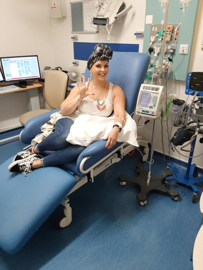 Palmer underwent a lumpectomy, six rounds of chemotherapy and 18 rounds of radiotherapy, pictured during her treatment. (SWNS)