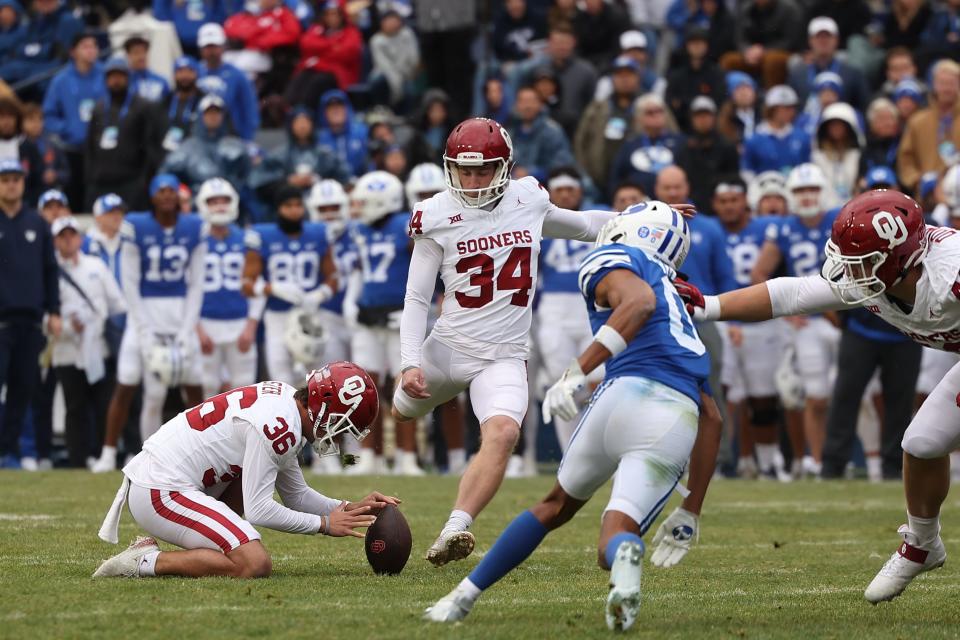 Nov 18, 2023; Provo, Utah, USA; Oklahoma Sooners place kicker Zach Schmit (34) kicks a field goal against the Brigham Young Cougars in the second quarter at LaVell Edwards Stadium. Mandatory Credit: Rob Gray-USA TODAY Sports