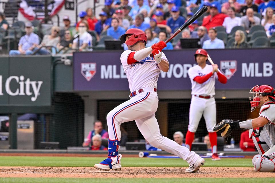 Rangers catcher Mitch Garver hit two homers and drove in six runs in his 2023 season debut against the Phillies.