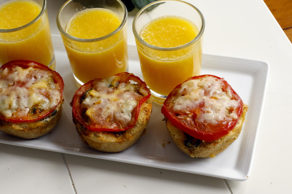 FILE - A serving of egg strata and juice is shown April 4, 2016, in Concord, N.H. Federal regulations dictate how many insect parts can exist in the flour such meals are made from, and foods generally are required by federal fiat to list nutrition, specify ingredients and be truthful. Federal regulations run through American life, from morning to night. (AP Photo/J.M. Hirsch, File)