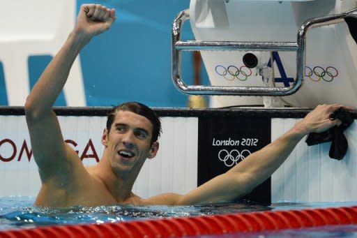 US swimmer Michael Phelps celebrates after winning gold in the men's 100m butterfly final at the London Olympics on August 3. Phelps closed his Olympic individual career in breathtaking style as America ruled the pool and records tumbled on the cycle track