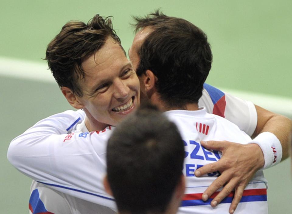 Berdych and Stepanek share a man-hug after their win over the Netherlands earlier this year. (AP Photo,CTK/Jaroslav Ozana)