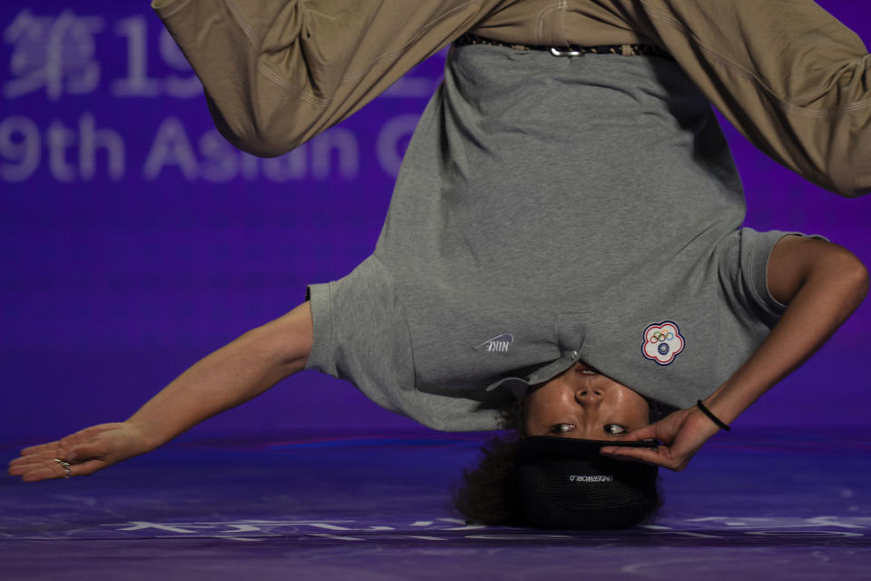 Taiwan's Yang Jia Li competes during the women's pre-selection for breakdancing at the 19th Asian Games in Hangzhou, China, Friday, Oct. 6, 2023. (AP Photo/Louise Delmotte)