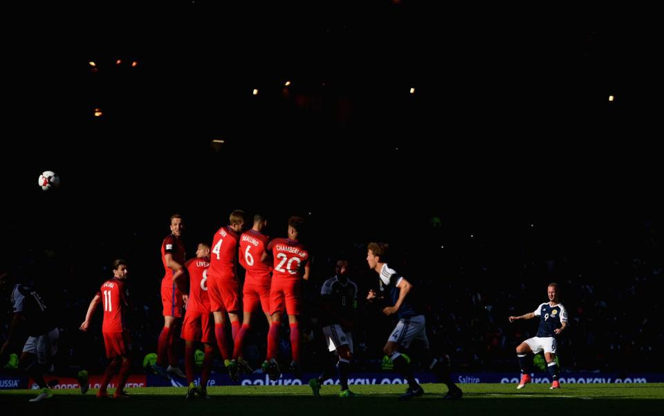 Place is rocking: Leigh Griffiths of Scotland scores his side's second goal from a freekick during the FIFA 2018 World Cup Qualifier against the Auld Enemy - Getty Images Europe