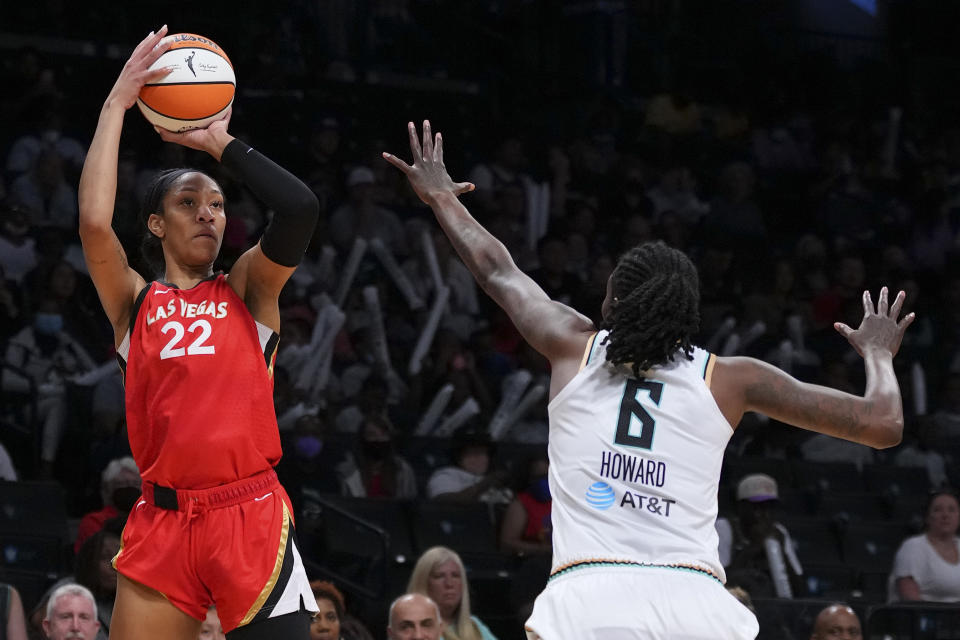 Las Vegas Aces forward A'ja Wilson shoots the ball against New York Liberty's Natasha Howard in the first half at Barclays Center on July 14, 2022. (Mitchell Leff/Getty Images)