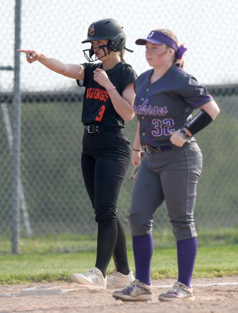 Hoover's Delany Shannon triples in the fourth inning against Jackson in the Division I district final in Massillon, Wednesday, May 17, 2023.