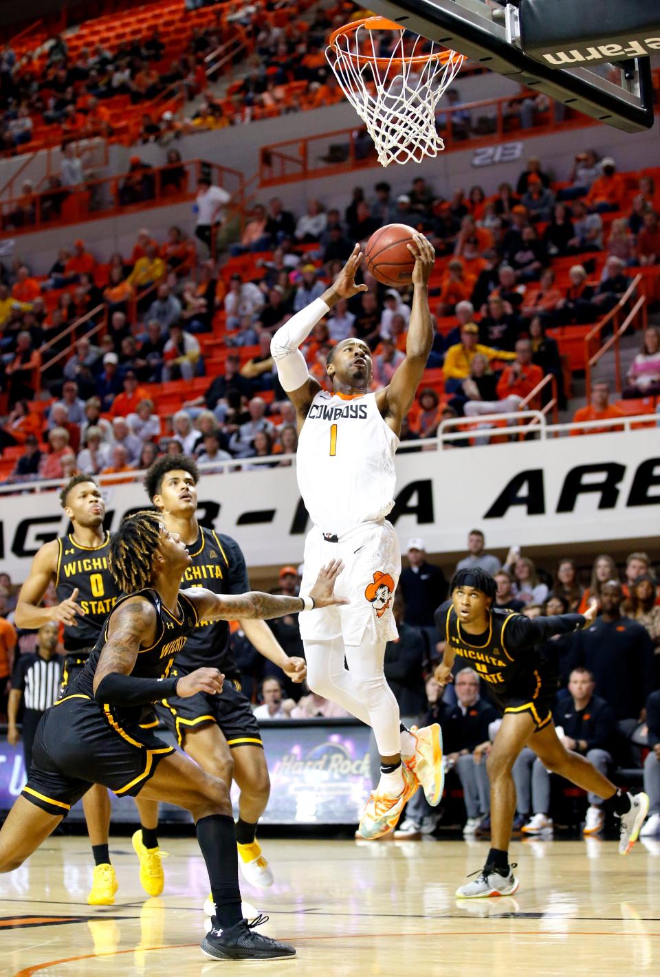 Oklahoma State's Avery Anderson III (0) goes up for a lay up in the second half during the college basketball game between the Oklahoma State Cowboys and the Wichita State Shockers at Gallagher-Iba Arena, Wednesday, Dec. 1, 2021. 