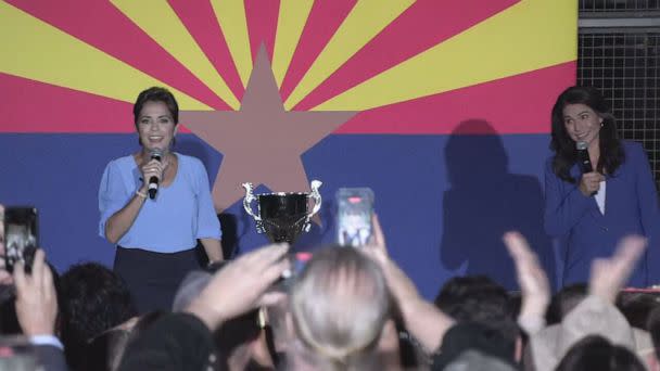 PHOTO: Tulsi Gabbard and Kari Lake appear onstage together at a campaign event for Kari Lake in Arizona, on Oct. 18, 2022. (ABC News)