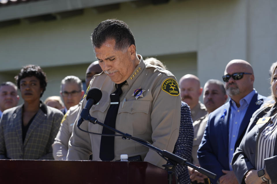 Los Angeles County Sheriff Robert Luna pauses while reading a statement during a press to announce an arrest in the ambush killing of sheriff's deputy Ryan Clinkunbroomer Monday, Sept. 18, 2023, in Palmdale, Calif. Clinkunbroomer was shot and killed while sitting in his patrol car Saturday evening in Palmdale.(AP Photo/Marcio Jose Sanchez)