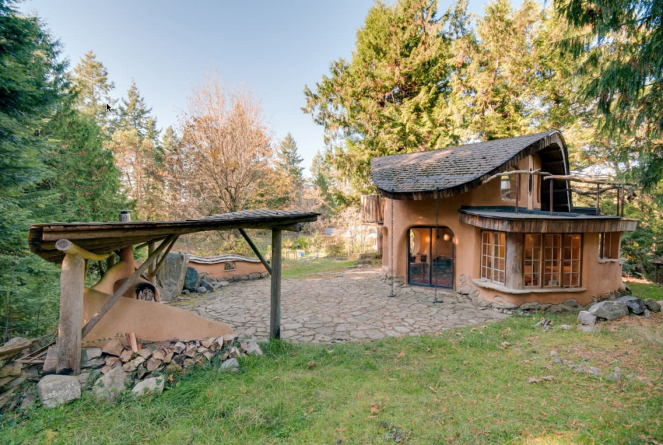 <p>The cozy retreat was hand-sculpted using sustainable and local materials. It also sits on a property with sheep, gardens and orchards. (Airbnb) </p>