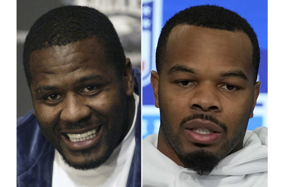 FILE - Philadelphia Eagles' Jeremiah Trotter, left, smiles during a news conference Friday, March 4, 2005, in Philadelphia. Clemson linebacker Jeremiah Trotter Jr. speaks during a news conference at the NFL football scouting combine, Wednesday, Feb. 28, 2024, in Indianapolis. Jeremiah Trotter was a four-time Pro Bowl middle linebacker who had three stints with the Philadelphia Eagles and also played for Washington and Tampa Bay during an 11-year career. His son was a finalist last year at Clemson for the Dick Butkus Award given to the best linebacker in the nation.(AP Photo/File)