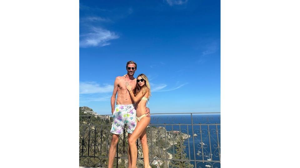 Abbey Clancy in whitw bikini and Peter Crouch shirtless in swimming trunks