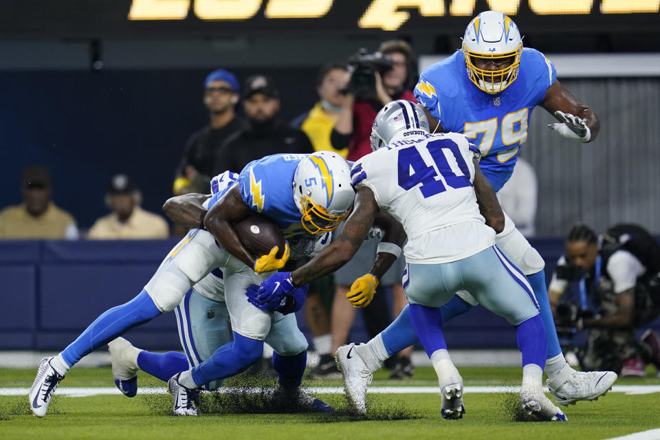 Los Angeles Chargers wide receiver Joshua Palmer (5) lunges in for a touchdown during the first half of a preseason NFL football game against the Dallas Cowboys Saturday, Aug. 20, 2022, in Inglewood, Calif. (AP Photo/Ashley Landis)