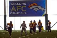 Denver Broncos wide receiver Eric Decker moves to catch a pass as they hold an indoor practice session for the Super Bowl at the New York Jets Training Center in Florham Park, New Jersey January 30, 2014. REUTERS/Ray Stubblebine