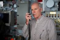 Secretary of the Navy Richard V. Spencer addresses the crew of the U.S. Navy aircraft carrier USS Gerald R. Ford