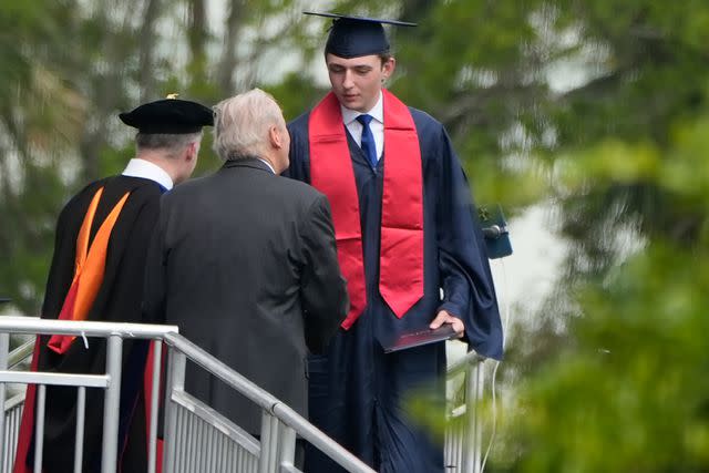 <p>AP Photo/Lynne Sladky</p> Barron Trump, son of Republican presidential candidate Donald Trump, receives his diploma on May 17, 2024
