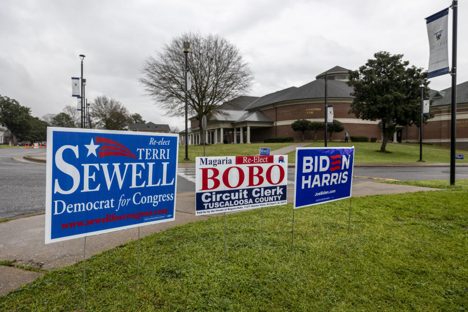 Political signs stand for view during a primary election, Tuesday, March 5, 2024, at Stillman College's Cordell Wynn Humanities & Fine Arts Center, Tuscaloosa County Ward 36, in Tuscaloosa, Ala. (AP Photo/Vasha Hunt)