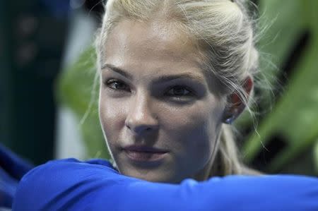 2016 Rio Olympics - Athletics - Preliminary - Women's Long Jump Qualifying Round - Groups - Olympic Stadium - Rio de Janeiro, Brazil - 16/08/2016. Darya Klishina (RUS) of Russia reacts before the competition starts. REUTERS/Dylan Martinez