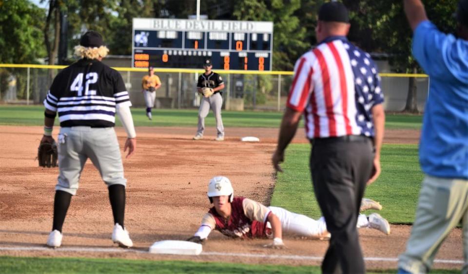 Golden Valley High School’s Coeh Heupel slides into third base during the Merced County All-Star Baseball Game on Saturday, June 10, 2023 at Merced College.