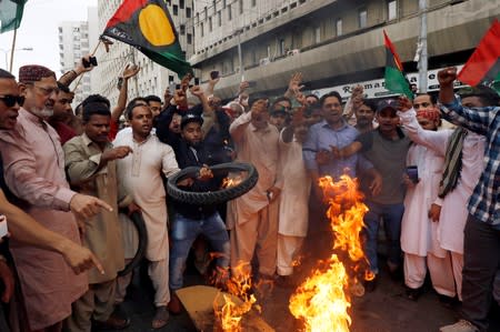 Supporters of political party Pakistan People's Party (PPP) chant slogans during a protest in Karachi