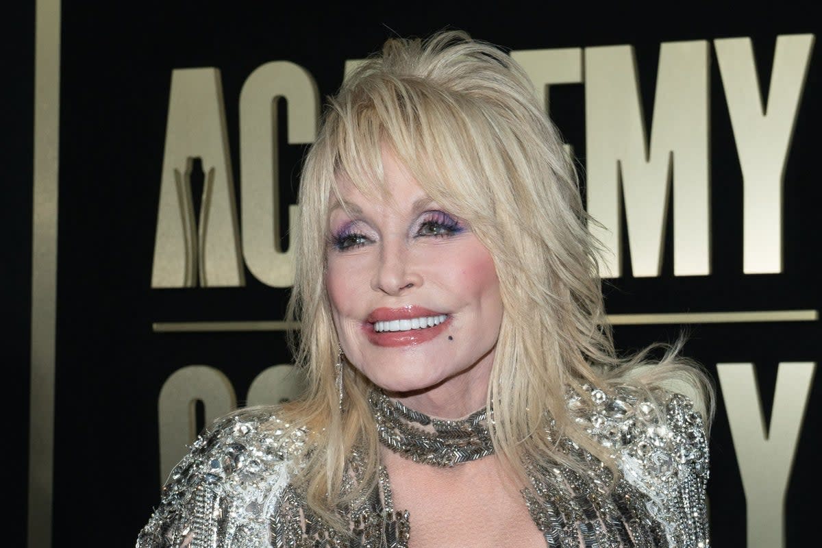 Dolly Parton has spoken about her plans for the future and they don’t involve retiring  (AFP via Getty Images)