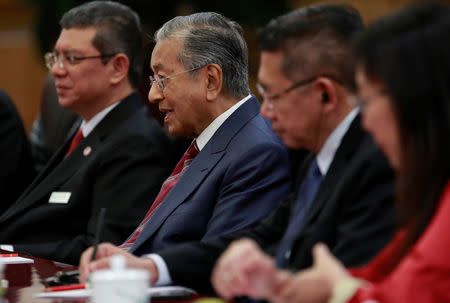 Malaysia's Prime Minister Mahathir Mohamad speaks during a meeting with China's Premier Li Keqiang (not pictured) at the Great Hall of the People in Beijing, China, August 20, 2018. How Hwee Young/Pool via REUTERS