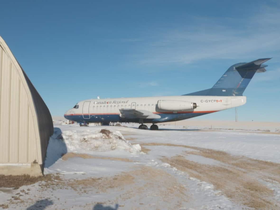 Millington says this Fokker F28-1000 flew all over Europe, and it was once painted bright yellow. (David Mercer/CBC - image credit)