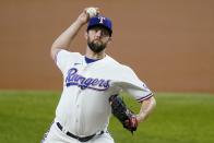 Texas Rangers starting pitcher Jordan Lyles throws to the New York Yankees in the first inning of a baseball game in Arlington, Texas, Monday, May 17, 2021. (AP Photo/Tony Gutierrez)