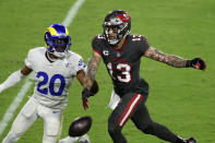 Los Angeles Rams cornerback Jalen Ramsey (20) knocks a pass away from Tampa Bay Buccaneers wide receiver Mike Evans (13) during the first half of an NFL football game Monday, Nov. 23, 2020, in Tampa, Fla. (AP Photo/Mark LoMoglio)